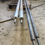 Pitkät moniosaiset sorvatut telat Pitkät moniosaiset sorvatut telat